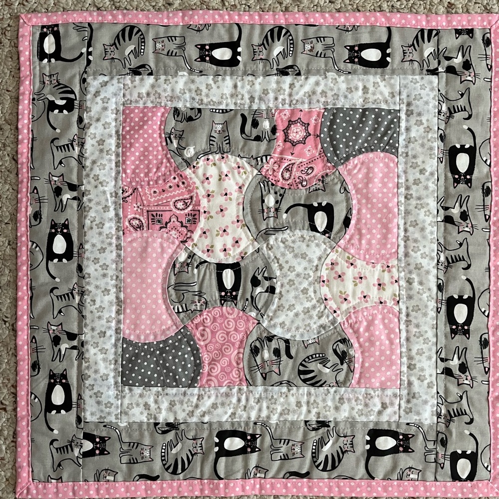 Mini quilt; hand pieced, machine quilted.
